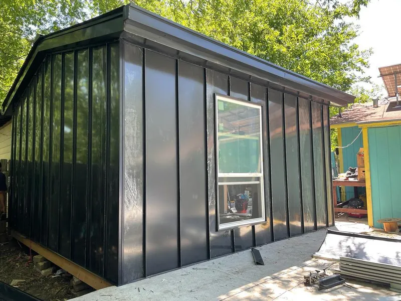 Black standing seam metal wall panels for Metal Roof Installation in Lincoln Park